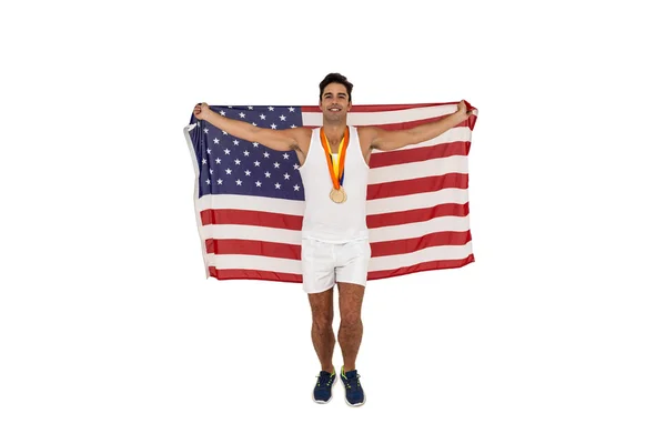 Athlete posing with gold medals after victory — Stock Photo, Image