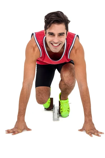 Retrato do homem atleta em posição pronta para correr — Fotografia de Stock