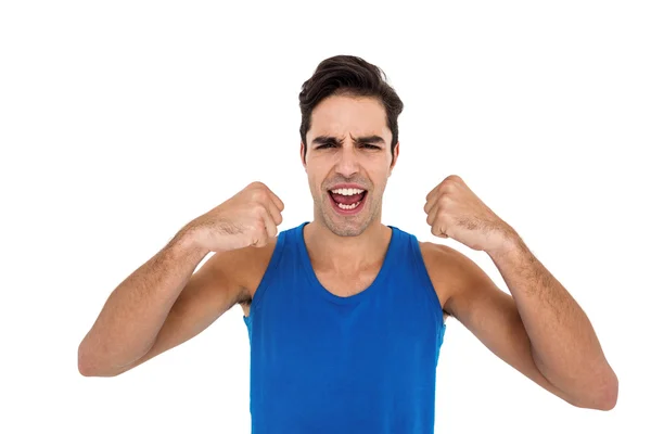 Excited male athlete posing after victory — Stock Photo, Image