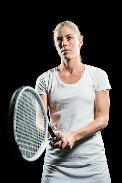 Tenista jugando al tenis con una raqueta — Foto de Stock