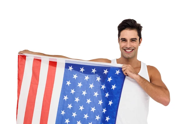 Atleta posando com bandeira americana — Fotografia de Stock