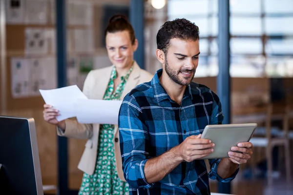 Coworkers looking different multimedias format — Stock Photo, Image