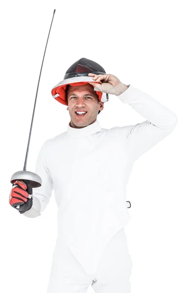 Man wearing fencing suit practicing with sword — Stock Photo, Image