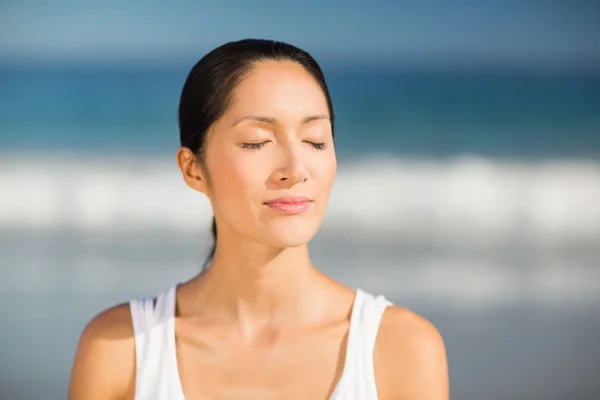 Beautiful young woman meditating — Stock Photo, Image