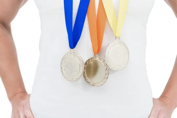 Atleta feminina usando medalhas — Fotografia de Stock