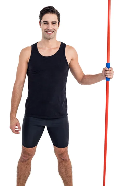 Retrato de atleta masculino feliz sosteniendo jabalina —  Fotos de Stock