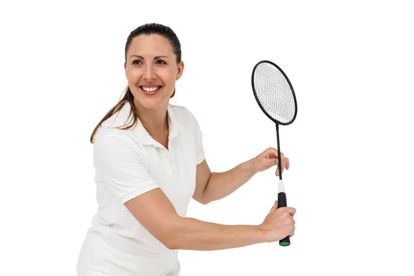 Jogadora feminina jogando badminton — Fotografia de Stock