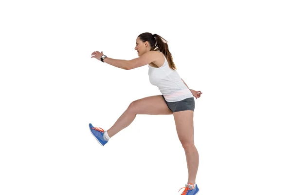 Atleta mulher correndo no fundo branco — Fotografia de Stock