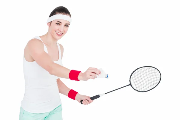 Kadın atlet badminton oynamaya — Stok fotoğraf