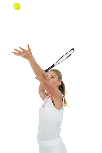 Athlete holding a tennis racquet ready to serve — Stock Photo, Image