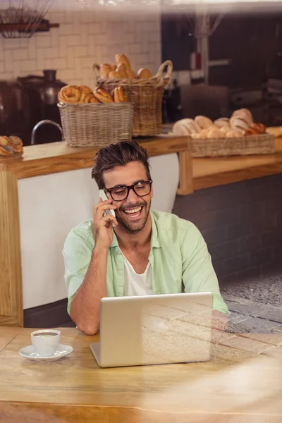 Hipster on the phone alone — Stock Photo, Image