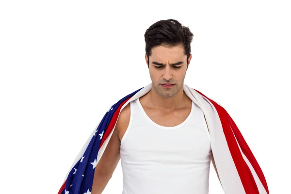 Sportovec s americkou vlajkou omotal kolem jeho těla — Stock fotografie