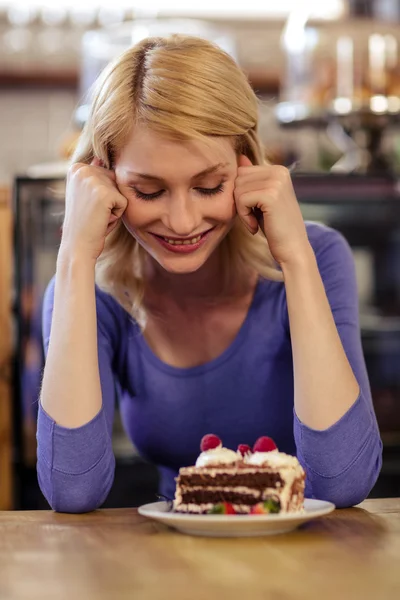 Customer with cake alone — Stock Photo, Image