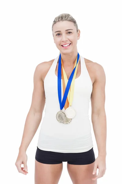 Athletin trägt Medaillen — Stockfoto