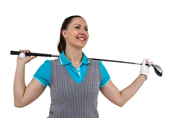 Golf-spelare håller en golf club och golfboll — Stockfoto
