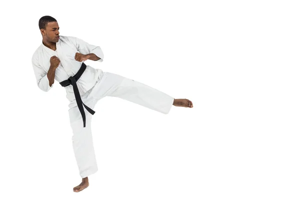 Fighter utför karate ställning — Stockfoto