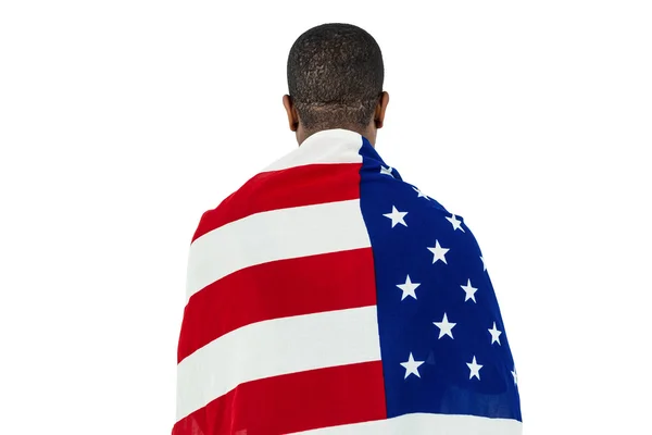 Idrottsman med amerikanska flaggan virad runt hans kropp — Stockfoto