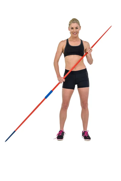 Athlete standing with javelin — Stock Photo, Image