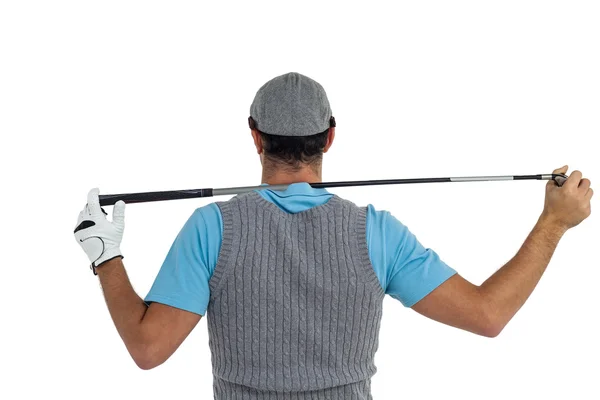 Rear view of golf player holding a golf club — Stock Photo, Image