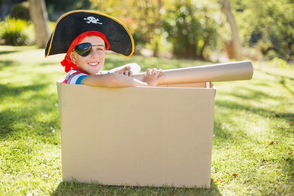 Smiling boy pretending to be pirate — Stock Photo, Image