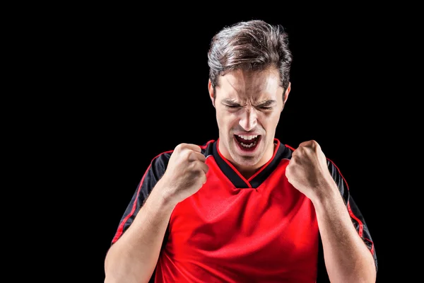 Male athlete posing after victory — Stock Photo, Image