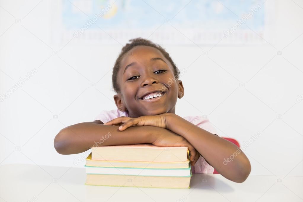 depositphotos_112922206-stock-photo-smiling-girl-with-books-in.jpg