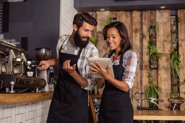 Waitress using tablet clipart