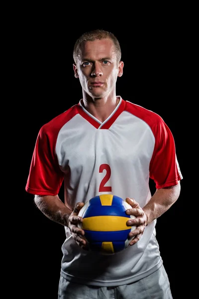 Sportsman innehar en volleyboll — Stockfoto