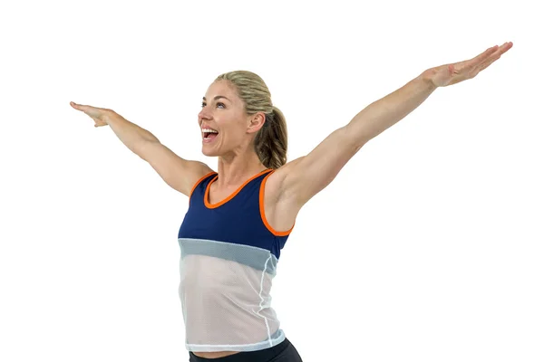 Podekscytowany lekkoatletka z rozpostartymi ramionami — Zdjęcie stockowe