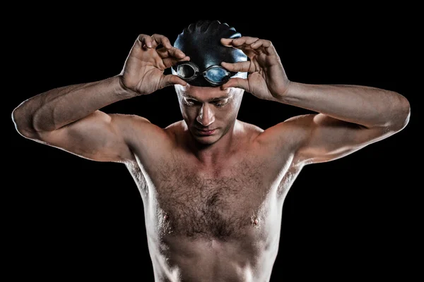 Holding yüzme yüzücü gözlüğü — Stok fotoğraf