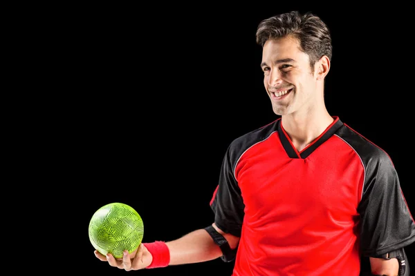 Hombre atleta feliz sosteniendo una pelota —  Fotos de Stock