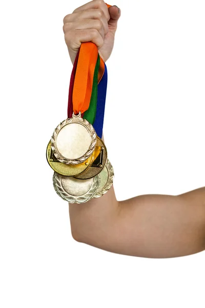 Sportovec drží zlaté medaile po vítězství — Stock fotografie