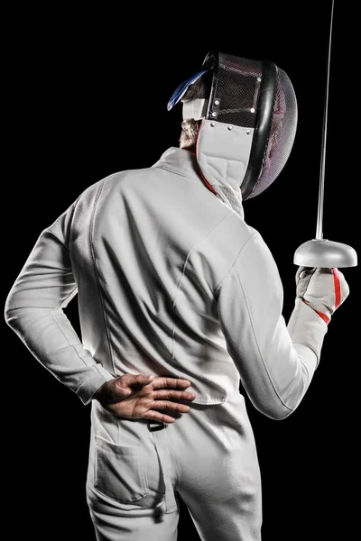 Man wearing fencing suit practicing with sword — Stock Photo, Image