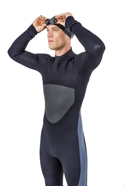Пловец в гидрокостюме в плавательных очках — стоковое фото