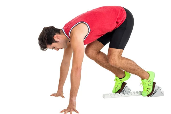 Atleta masculino em posição pronta para correr — Fotografia de Stock