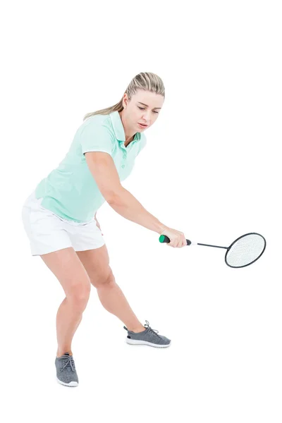 Loira bonita jogando badminton — Fotografia de Stock