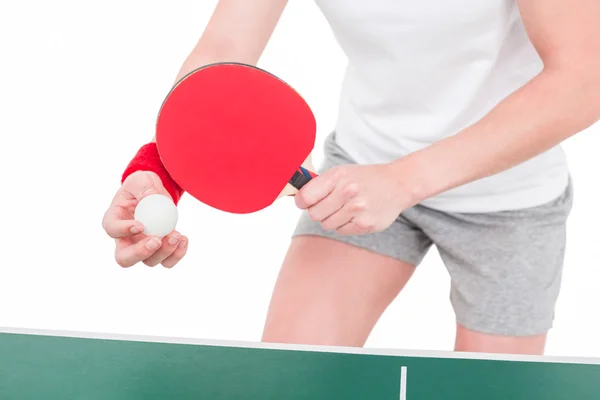 Atletka hraje ping pong — Stock fotografie