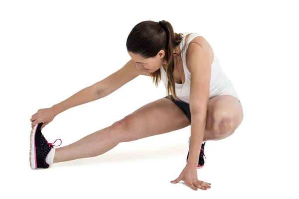 Athlete woman stretching her hamstring — Stock Photo, Image