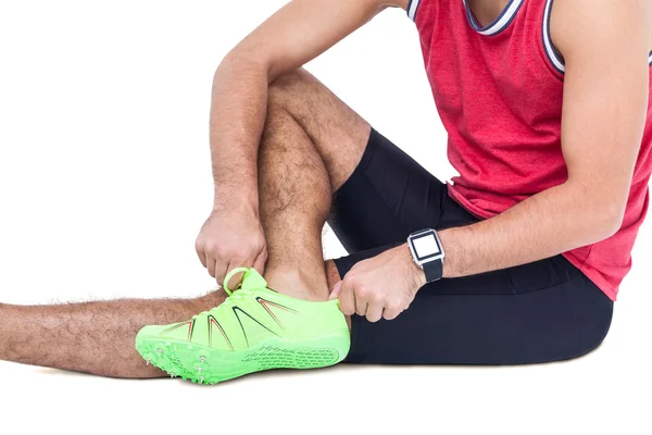 Male athlete wearing his sport shoes — Stock Photo, Image