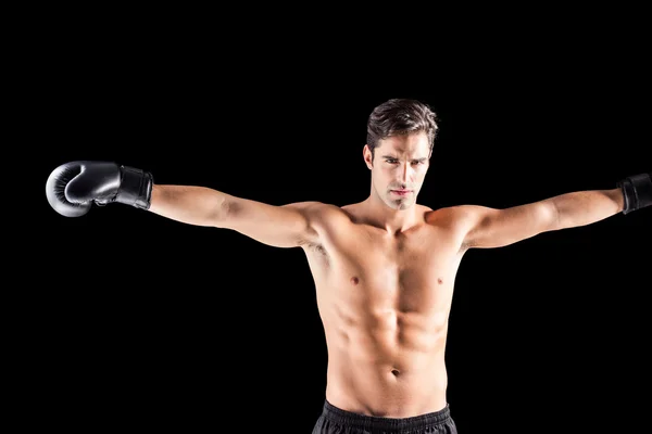 Boxer standing with arms outstretched — Stock Photo, Image