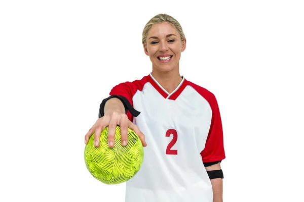 Årets idrottskvinna håller en boll — Stockfoto