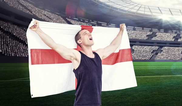 Idrottsman håller england flagga — Stockfoto