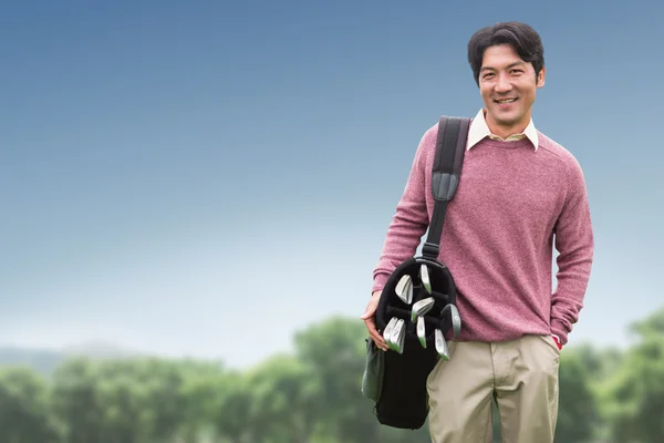 Man with golf equipment — Stock Photo, Image