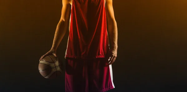 Basketball player holding ball — Stock Photo, Image