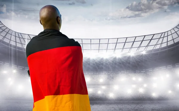 Man wearing German flag — Stock Photo, Image