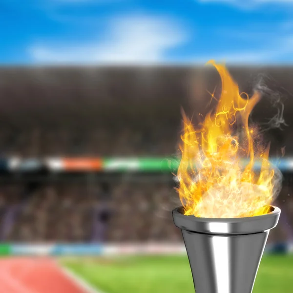 Olympic fire against view of stadium — Stock Photo, Image