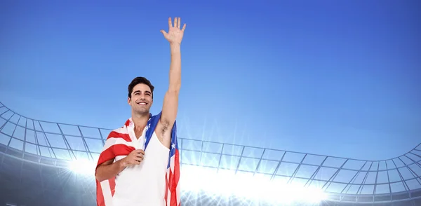 Atleta con bandera americana envuelta —  Fotos de Stock