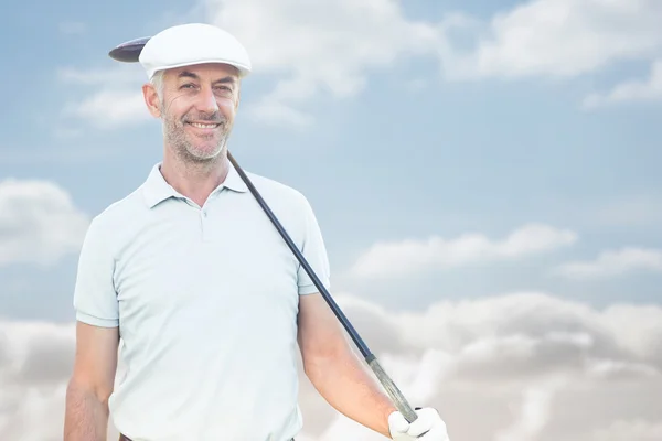 Uomo in possesso di golf club — Foto Stock