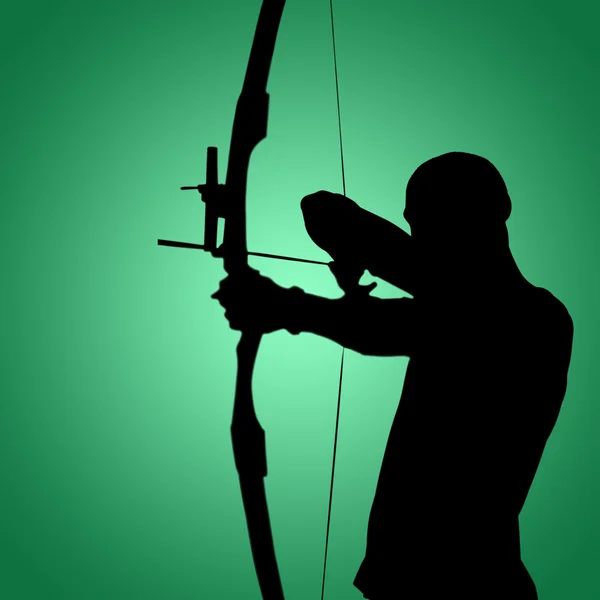 Hombre practicando tiro con arco — Foto de Stock