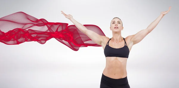 Athlète féminine levant les bras — Photo